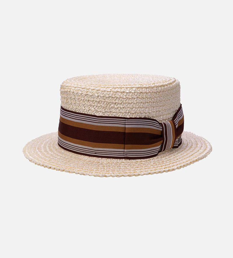 oblique view of womens straw boater hat